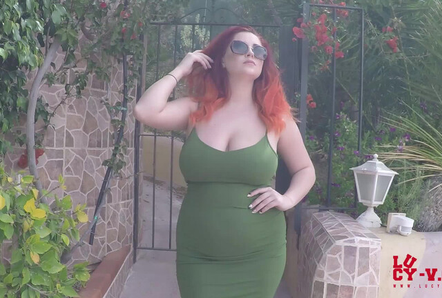 Lucy V in sexy green dress